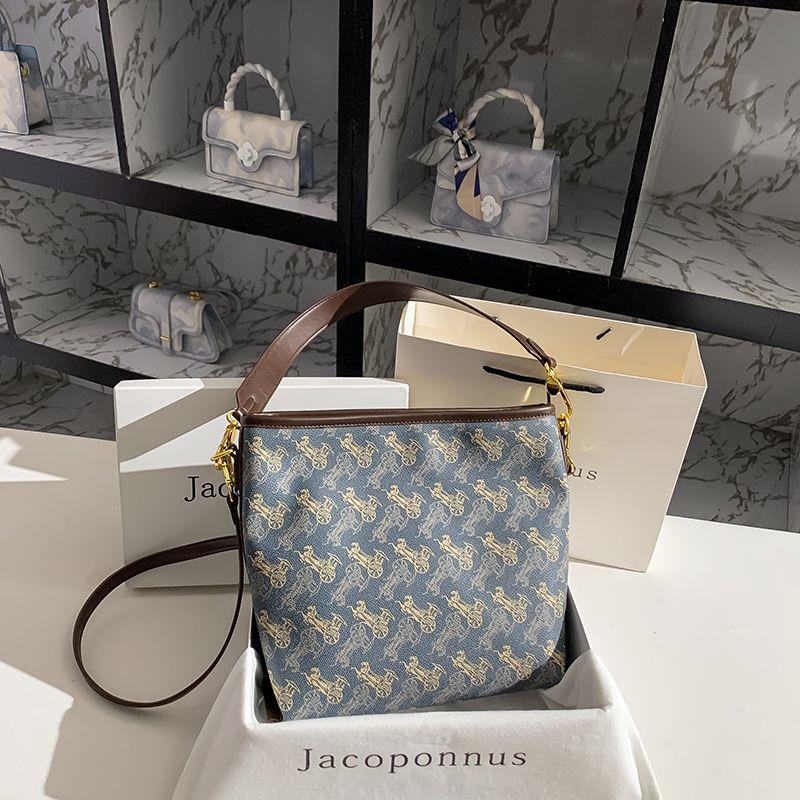 

Accessible Luxury Fall Niche Style Work Work Clothing One-Shoulder Bucket Bag Coffee with carriage Blue