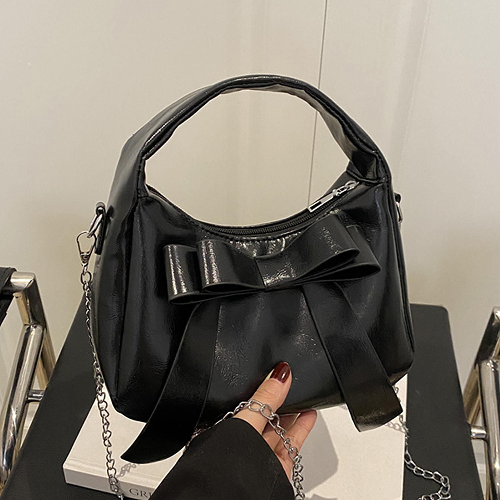 

2025 весна новый нишевый дизайн бант простой универсальный сумка подмышку сумка на плечо портативная сумка-полумесяц женская чёрный