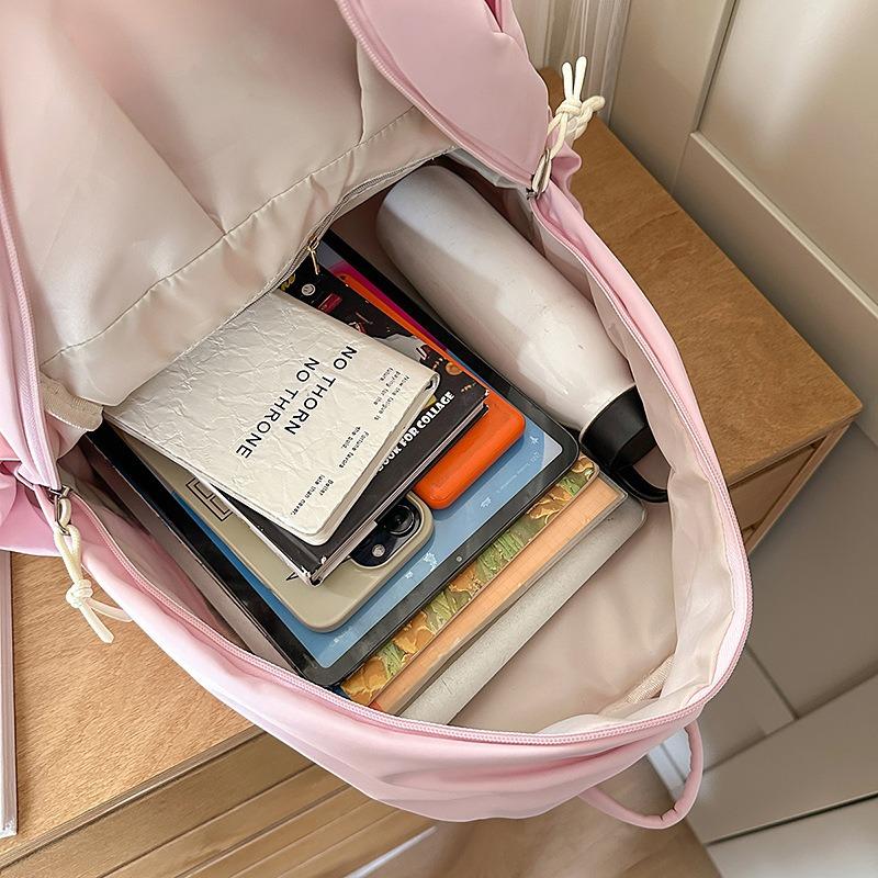 New high-value, fresh, sweet and cute candy-colored backpack, high school student large-capacity backpack.