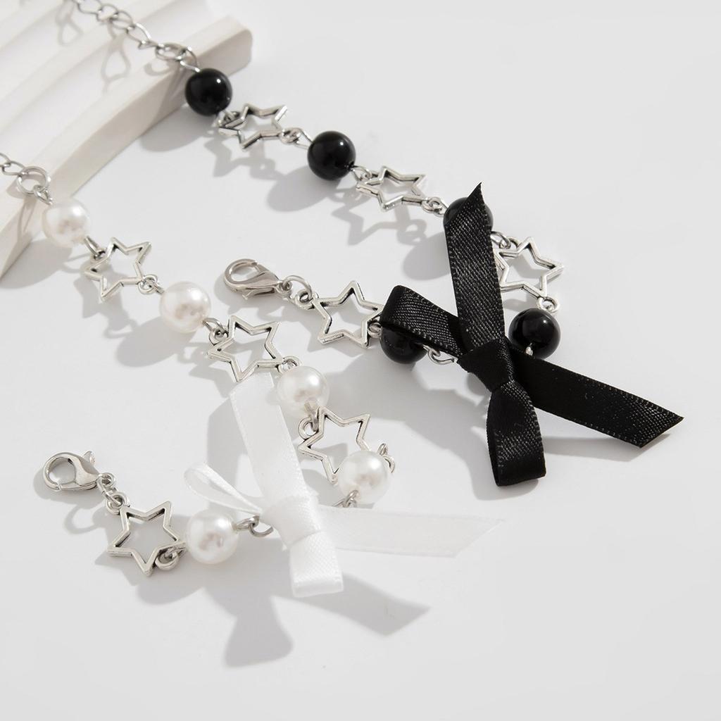 Bowknot Tassel Bracelet with Faux Pearl Accents Fashionable Bowknot Tassel Bracelet for Girls Showcasing Elegance