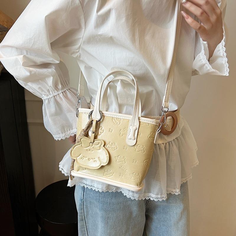 Casual large-capacity tote bag women's bag new niche embossed commuter shoulder oblique span bag bucket bag