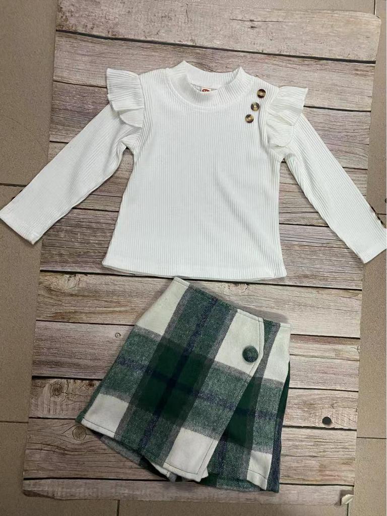 Mädchen Herbst- & Winterset: Einfarbiges geripptes Oberteil mit Flatterärmeln, mit unregelmäßig kariertem Rock und Hose