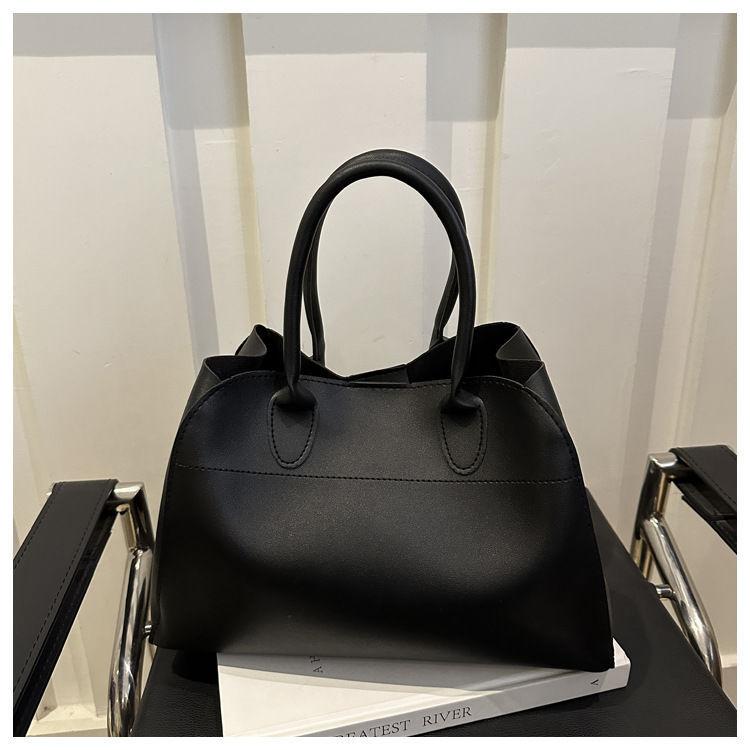 

Большая сумка женская весенне-летняя новая корейская версия простая и универсальная ручная сумка сумка большого объема через плечо сумка-тоут женская сумка чёрный