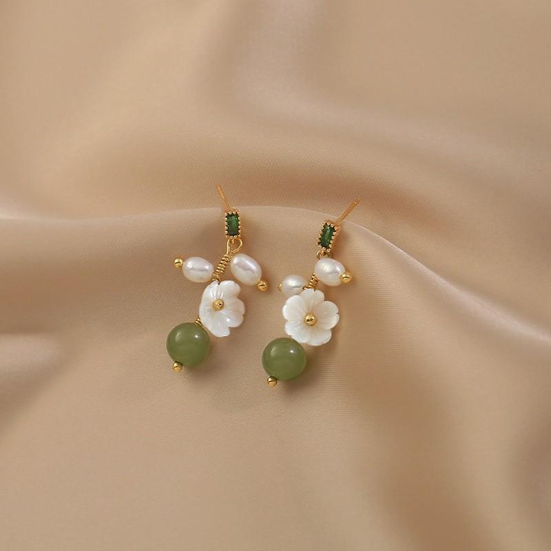 

Natural stone freshwater pearl flower earrings women s gentle and elegant winding pearl stud earrings niche temperament earrings