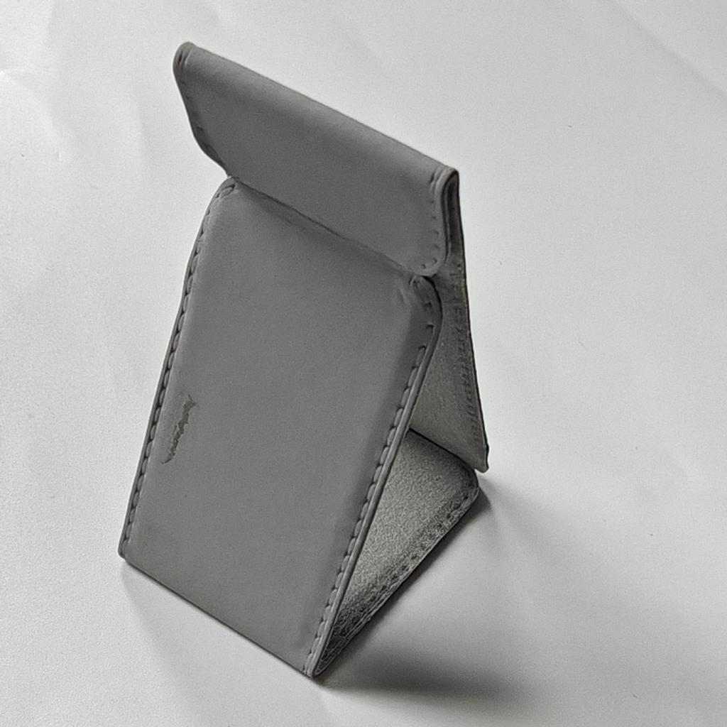 Universal PU Leather Phone Stand: Magnetic, Stick-On Holder for Foldable Android, Apple, and Huawei Devices