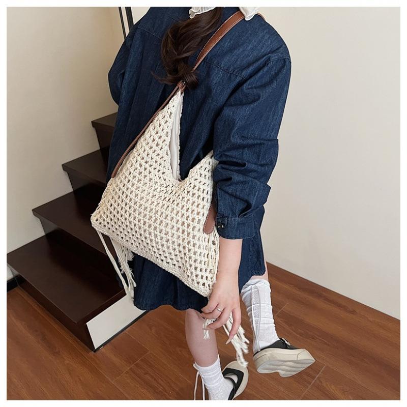Vintage tassel hollow braided underarm bag women's summer versatile hand-woven vacation shoulder tote bag