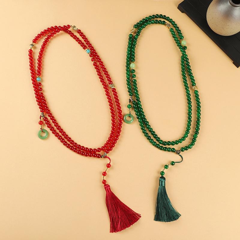 

Elegant 108-Bead Tassel Necklace: Vintage Chinese Crossbody Sweater Chain for Women