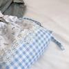 2025 new floral plaid drawstring shoulder bag student Korean version handbag large capacity portable ins commuter bag