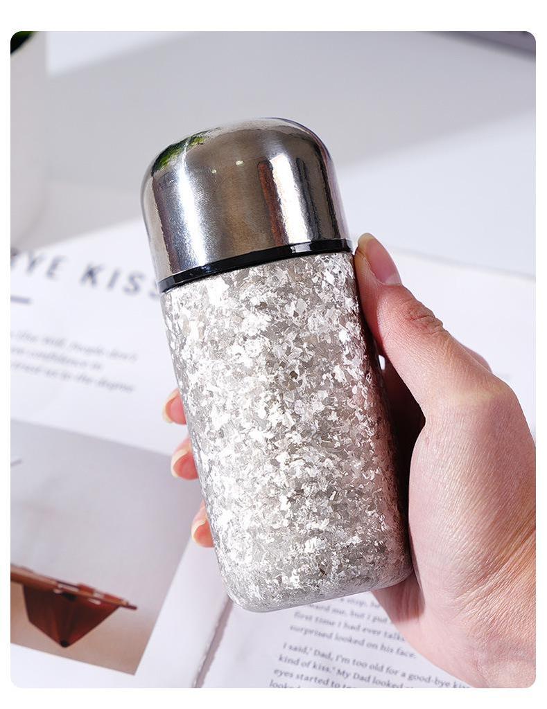 > Sleek Mini Titanium Antibacterial Double-Layer Thermos Cup - Portable, High-Value, Pocket-Sized.