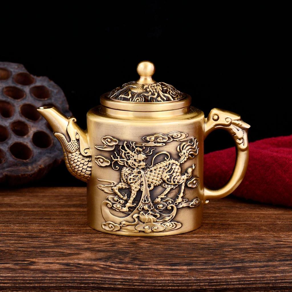 Brass Rotating Qilin Teapot: Creative Light Luxury Copper Handicraft Ornament for Home or Office.