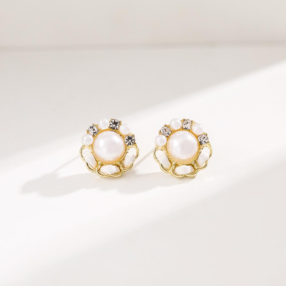 Boucles d'oreilles élégantes de couleur or pour femmes, tempérament blanc, boucles d'oreilles irrégulières, bijoux tendance, cadeaux