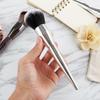 Single makeup brush, large loose powder brush, honey brush, blush brush, highlight brush, extra paint large soft bristle.