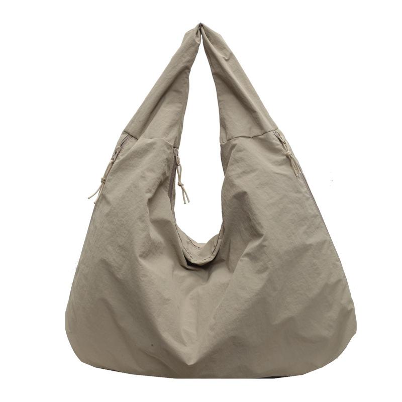 Slack fashion casual canvas tote bag women's new versatile large capacity armpit bag commuter shoulder bag