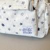 Star-Printed Backpack with Front Zipper Pocket and Tassel Details for School and Daily Use
