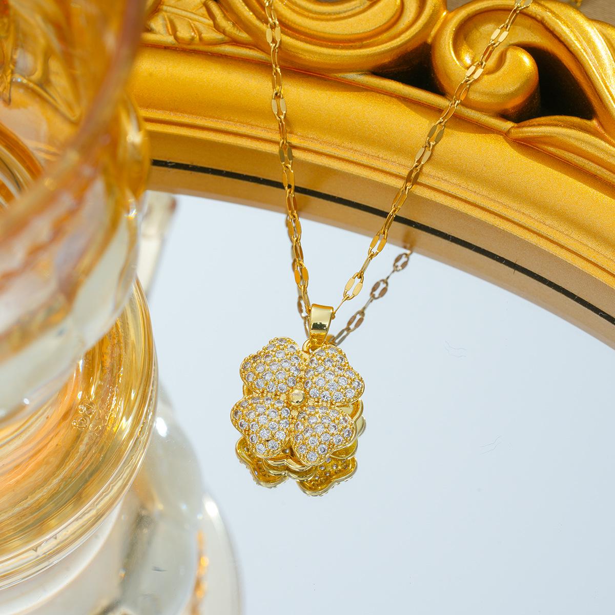 

Ожерелье из титановой стали с камнем «кошачий глаз» - Вращающееся украшение «четырехлистный клевер», Высококачественное, Устойчивое к выцветанию.