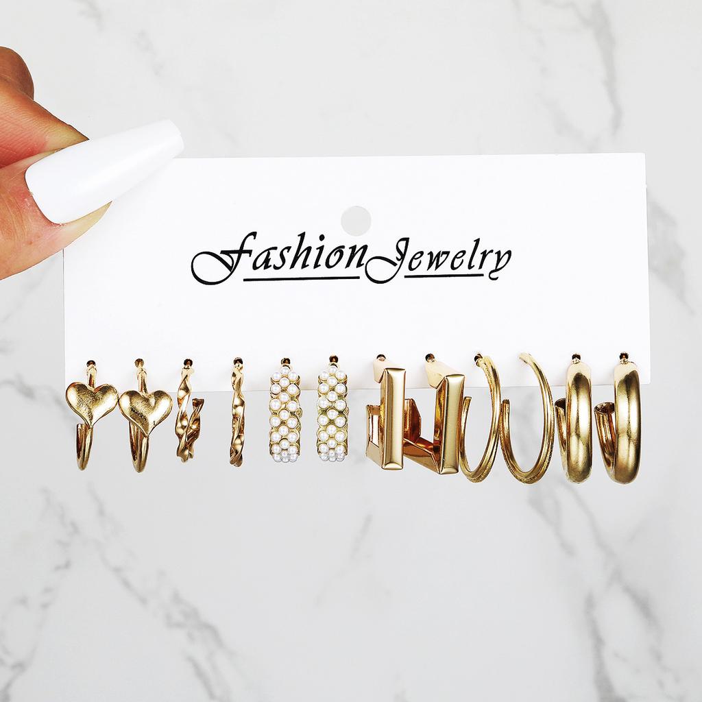 Hot-selling Retro Exaggerated Women's Peach Heart Stud Earrings Twist Twisted Pearl Earrings 11-piece Set of Earrings
