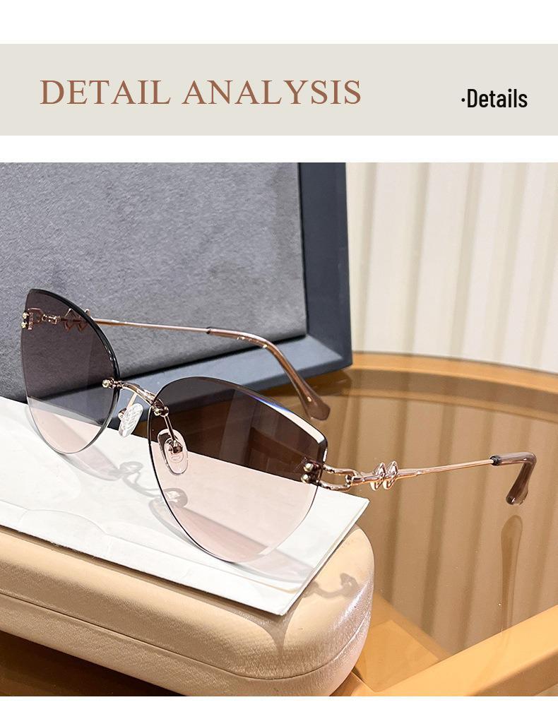 Women's Frameless Oval Metal Retro Sunglasses - High-End Japanese & Korean Fashion