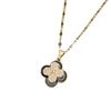 Women's Rotating Four-Leaf Clover Necklace with Colorful Zircon – Elegant Light Luxury Design