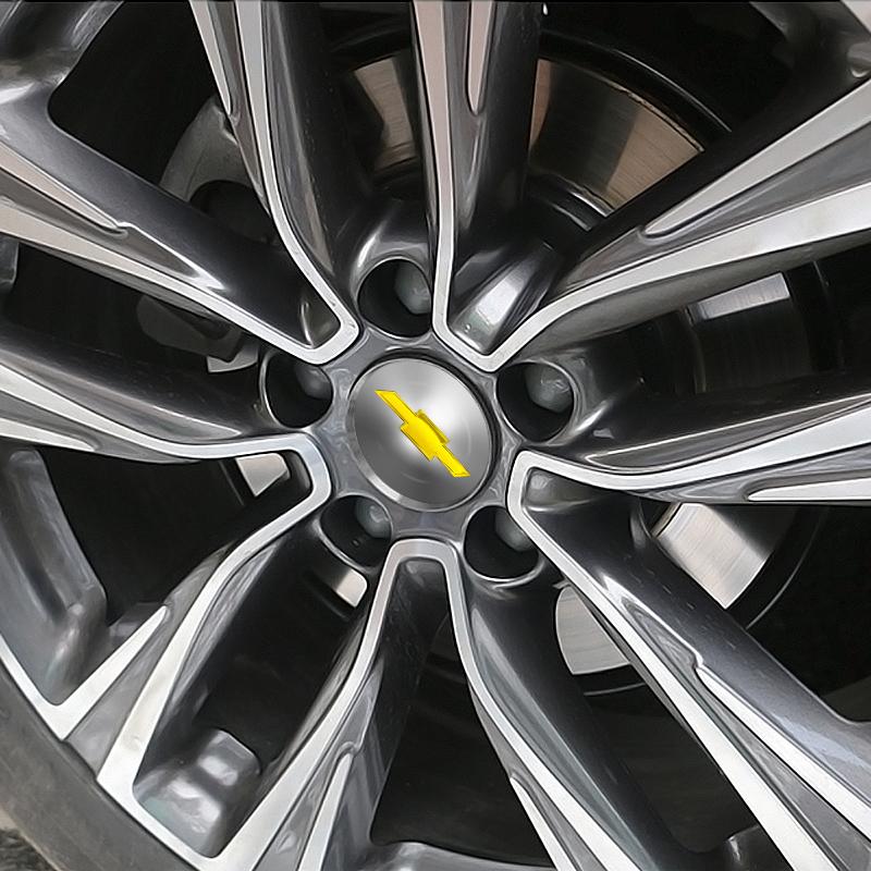 4 szt. 56 mm Stop aluminium Naklejka na środek koła samochodowego Naklejka na piastę do Chevrolet Malibu XL Equinox Akcesoria Osłony progów drzwi samochodu
