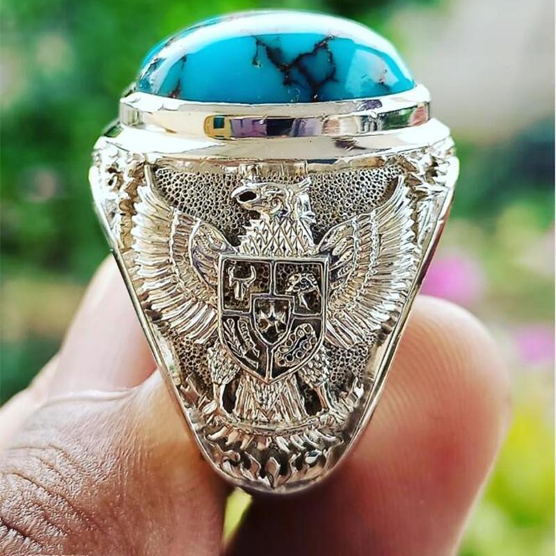 Ekologický stříbřený prsten s tyrkysovým kamenem a retro orlem