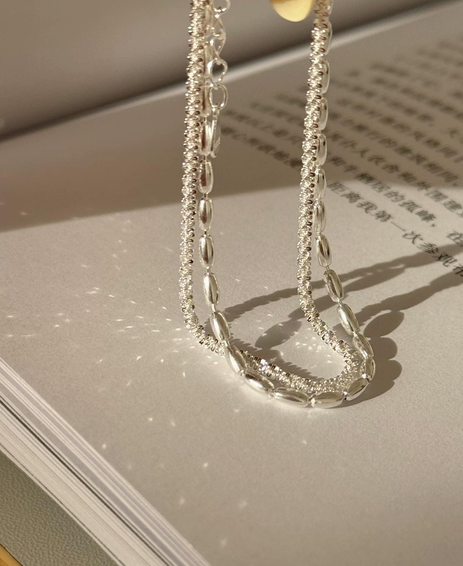 

Women s Double-Layer Star Bracelet: Personalized Light Luxury with Sparkling Rice Grain Design