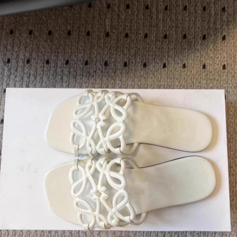 

Нішеві порожнисті капці жіночі для вулиці 2025 літо нові універсальні повсякденні пляжні сандалі на плоскій підошві капці з одним ремінцем 40 білий