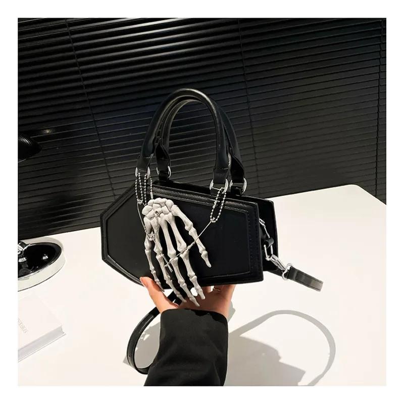 Autumn and winter new popular solid color leather punk style hand bone decoration portable fashion trend shoulder bag