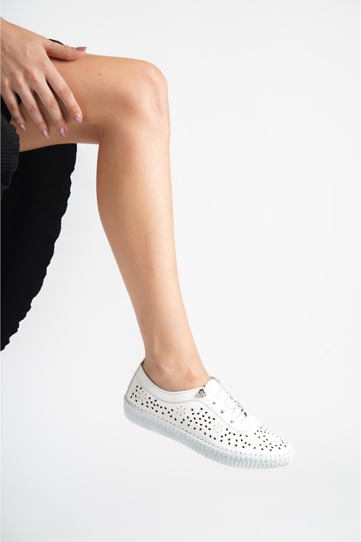 

Белая женская кожаная повседневная обувь из натуральной кожи