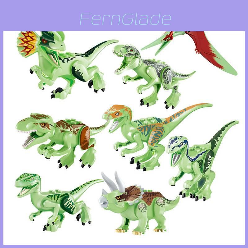 Conjunto de 8 blocos de montar fluorescentes de dinossauros jurássicos para crianças. Material atóxico e seguro.