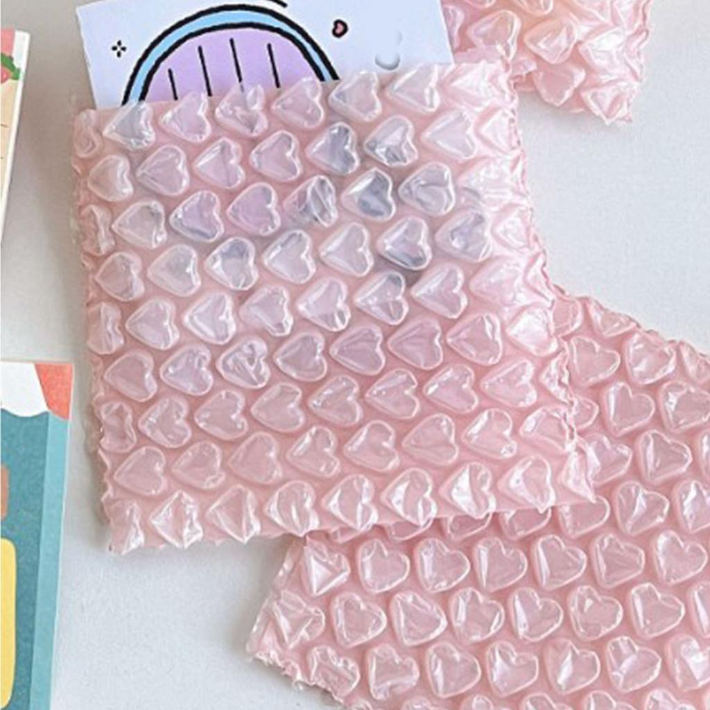 Kleine Luftpolstertaschen PE Rosa Herzmuster Stoßfest Wasserdicht Luftpolsterungstaschen zum Verpacken Expressversand
