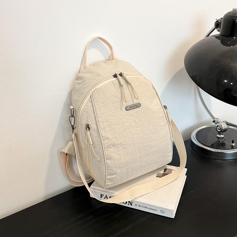 

Summer popular fashion versatile simple solid color student schoolbag going out commuting versatile backpack women білий