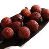 Purple Sandalwood Lychee Wenwan Handheld Ornament: Agarwood Craft for Office Tea Table.