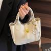 Stylish and simple solid color texture large capacity shoulder bag women's new portable messenger bag commuter bag