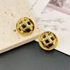 Vintage Hollow Compact Button Contrast Earrings Premium Sense Women'S Stud Earrings