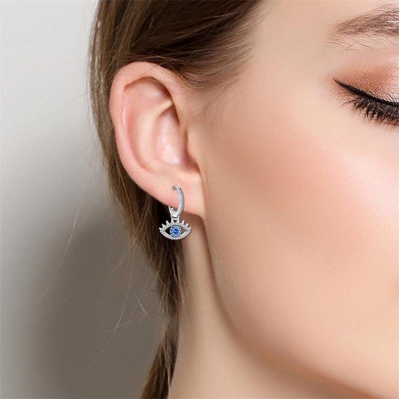 S9 Sterling Silver Blue Travel Magic Eye Earrings Earrings European Premium Beauty
