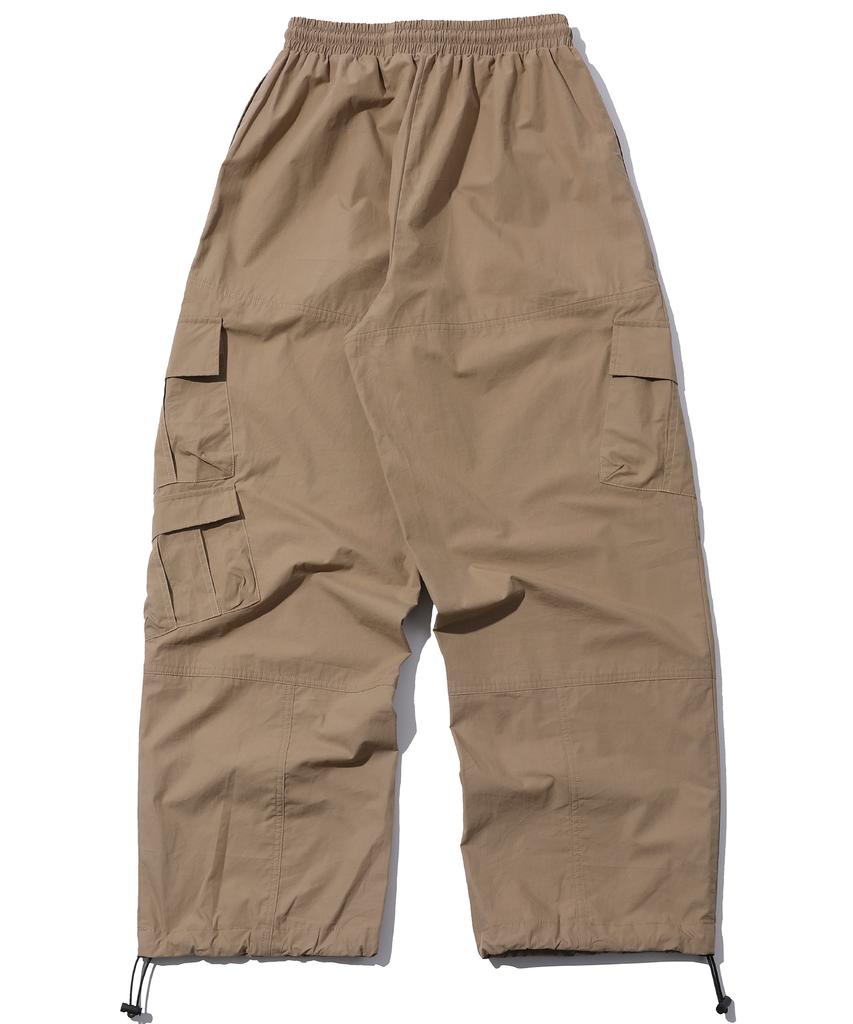 CPGN STUDIO Weite Cargohosen Beige