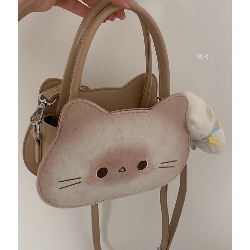 Korean cute cartoon kitten handbag women's 2025 new fashion niche one-shoulder messenger bag one-piece delivery