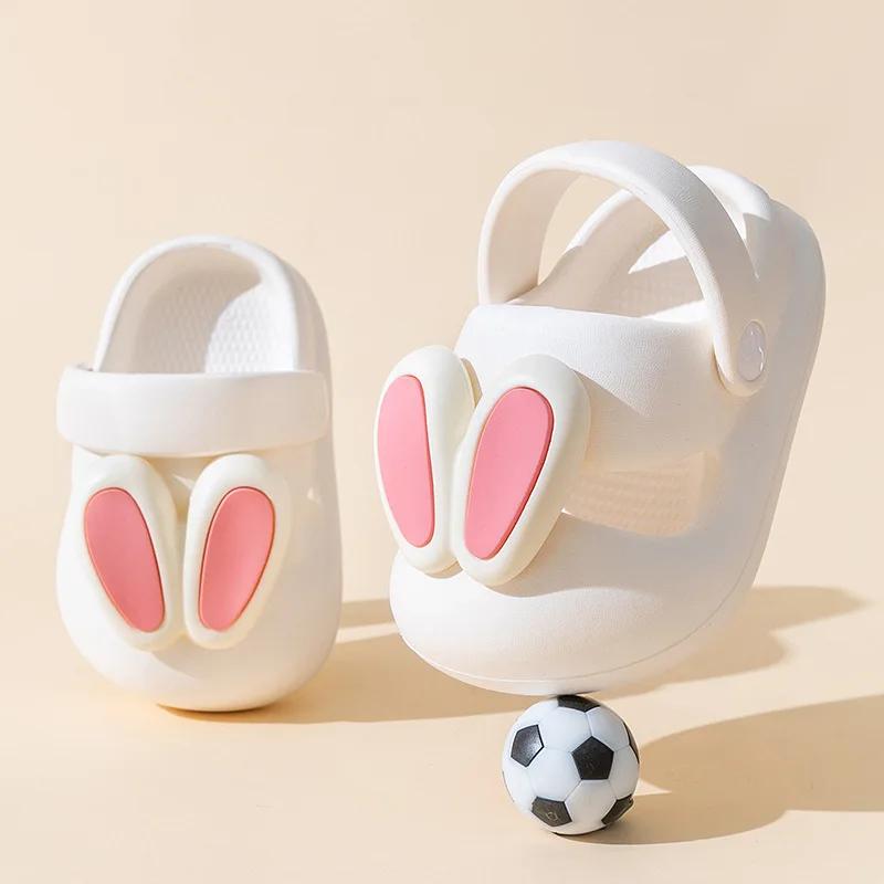 

Летние тапочки Новые милые тапочки с кроликом для девочки Мультяшные нескользящие тапочки на мягкой подошве Детская обувь Повседневные Легкие Модные Крутые тапочки 2025 insole16cm белый