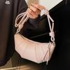Fashion and leisure Korean version of simple wind horn bag commuting versatile niche design high-end messenger bag woman