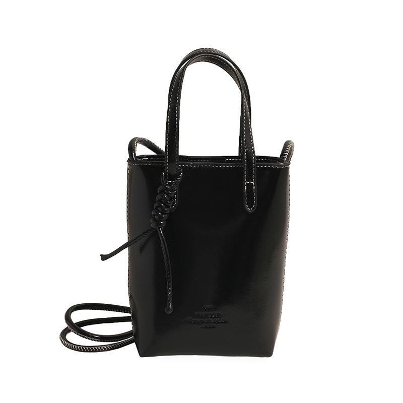 

Han niche fashion mobile phone bag women s 2026 spring and summer new simple small square bag shoulder messenger bag 15*6*19 чорний
