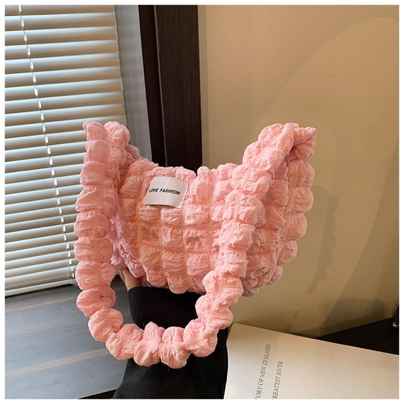 

Large capacity solid color shoulder bag new Internet celebrity pleated cloud underarm bag niche commuter pleated bag wholesale рожевий