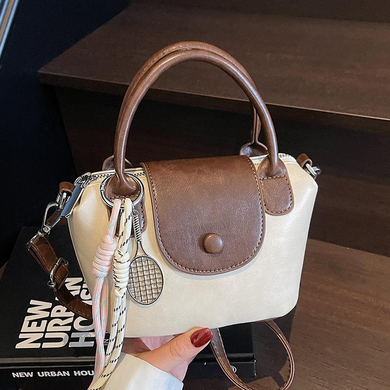 2025 new niche retro contrasting colors high-end portable dumpling bag versatile commuter daily casual messenger women's bag