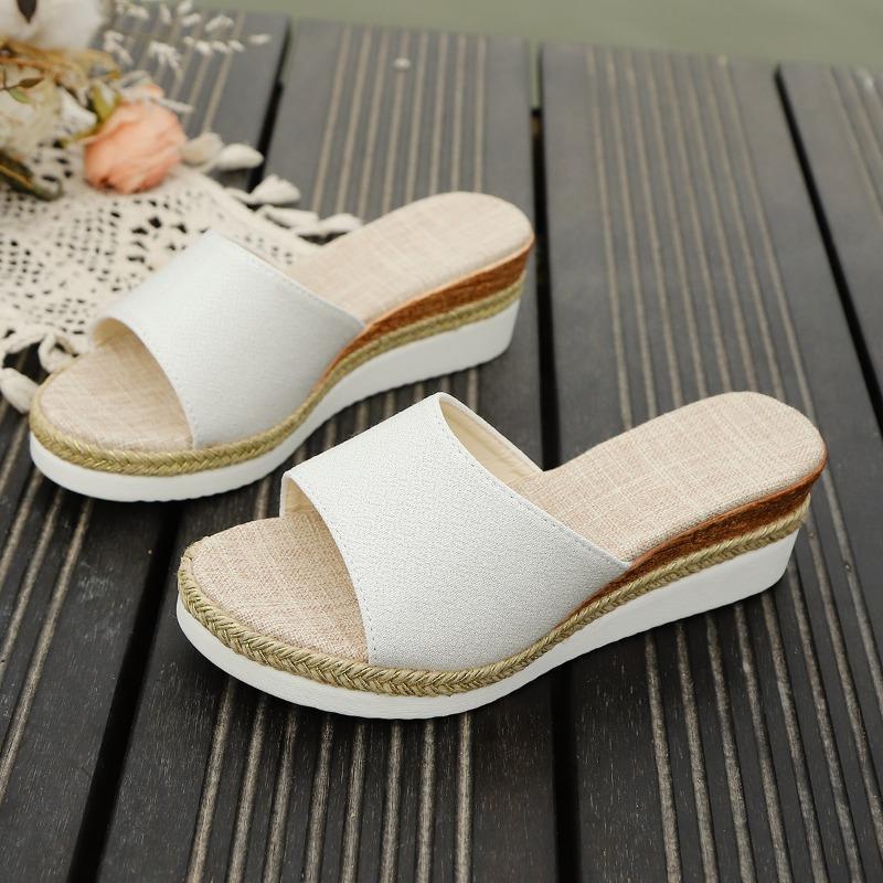 Summer new slope heel slippers women's large size thick bottom medium heel beach fish mouth one-word cool slippers