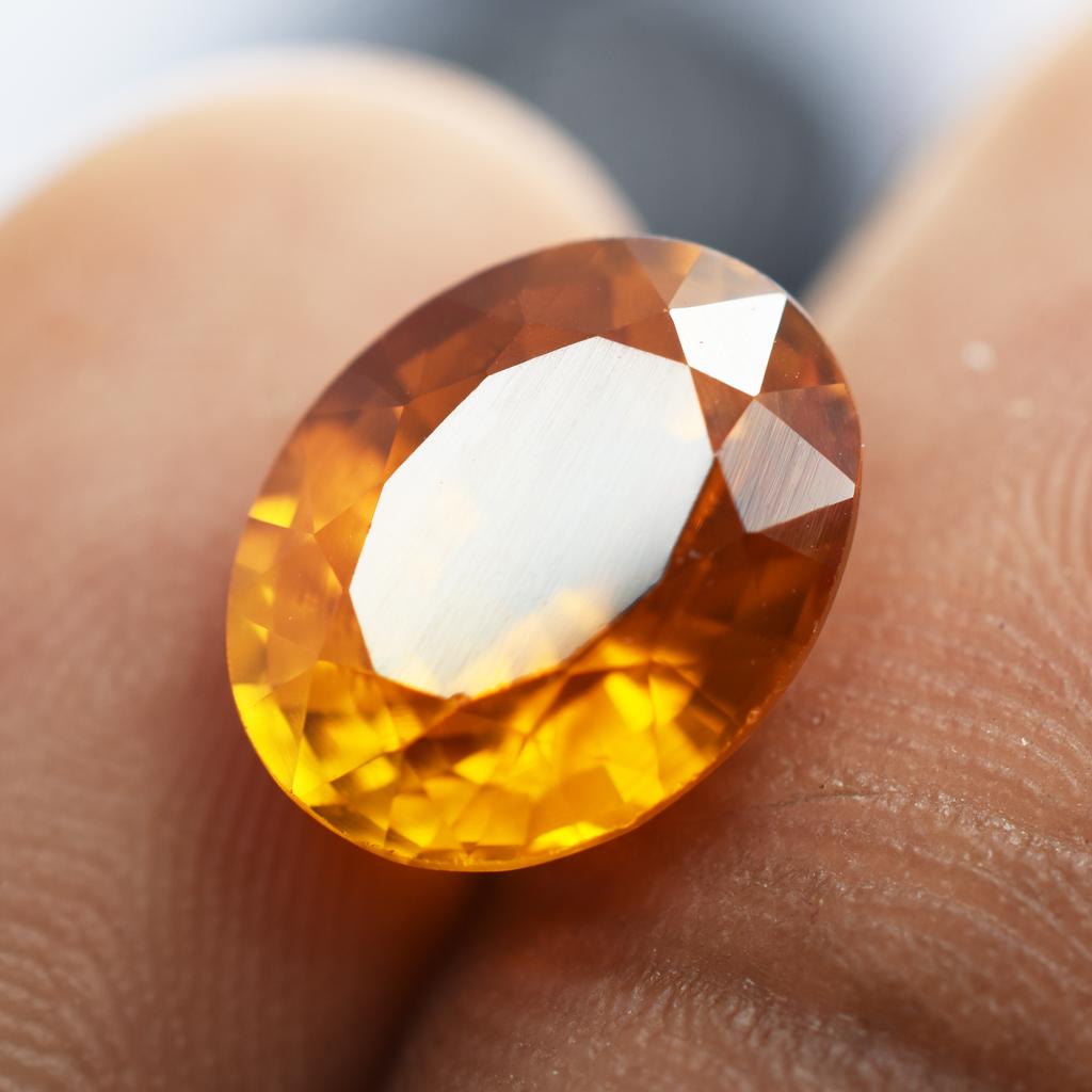 Natural Orange Sapphire Loose Gemstone 5.55 ct Oval Cut September Birthstone for Gem Collections