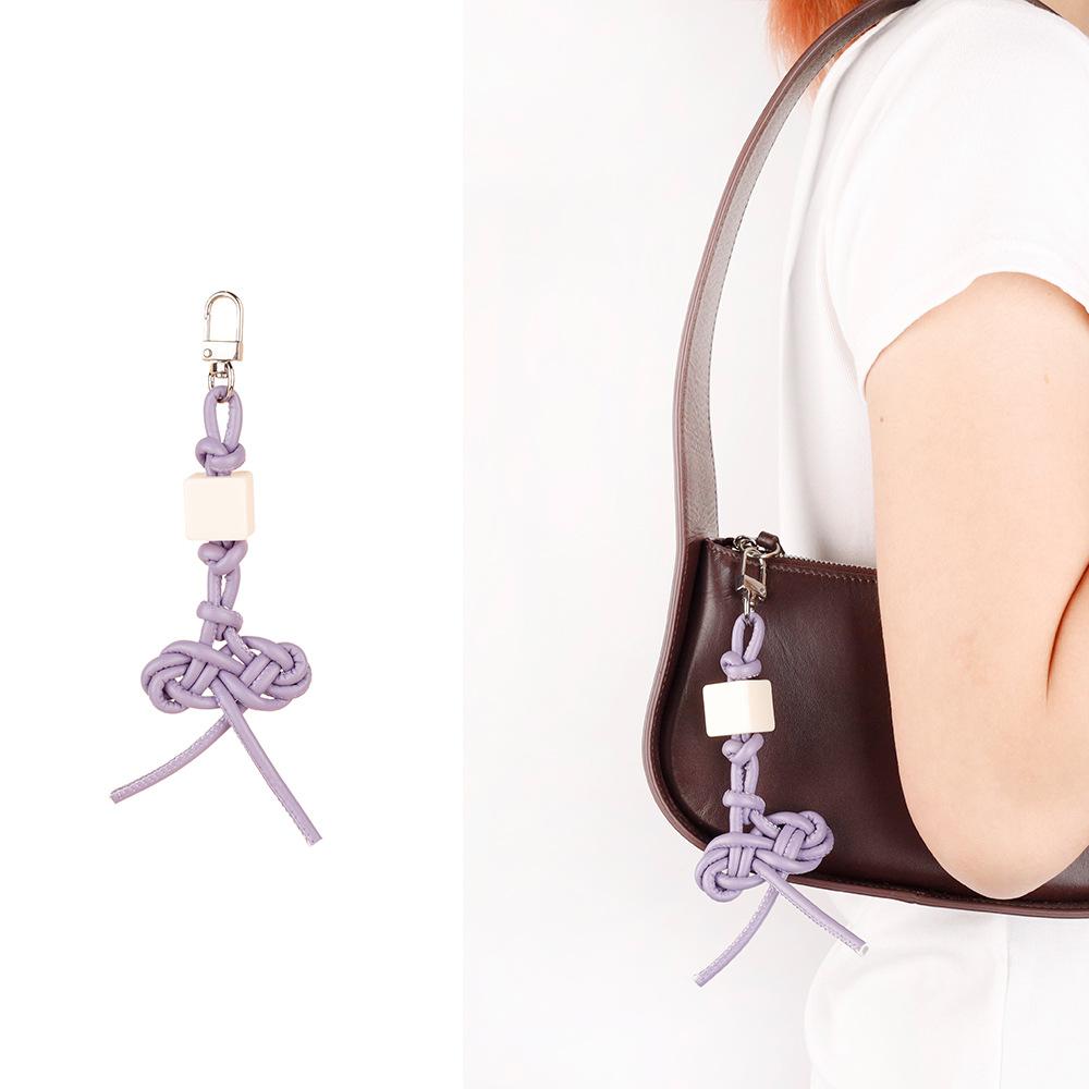 MIU series creative color hand-woven ruyi knot pu leather cord accessories bag pendant keychain