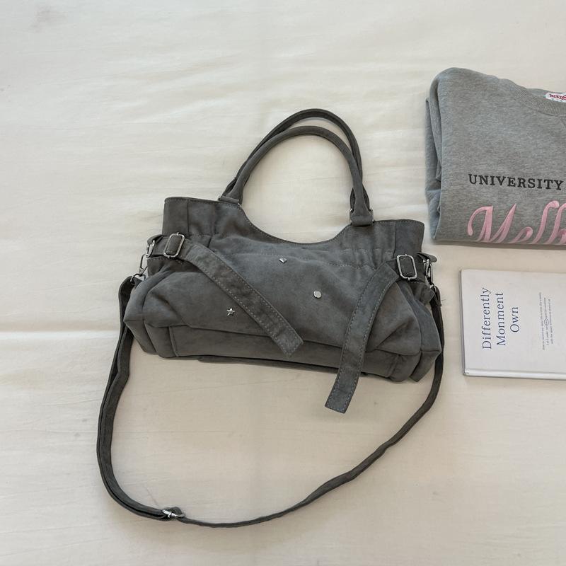 Motorcycle-style Bag with A Lady's Crossbody Strap for Commuting, A Shoulder Bag, and A Tote Bag.