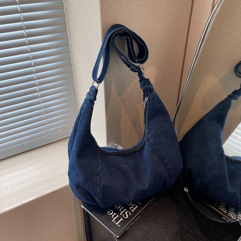 

Summer new foreign style texture simple and fashionable large-capacity bag 2025 casual personality women s shoulder messenger bag темно-синього кольору