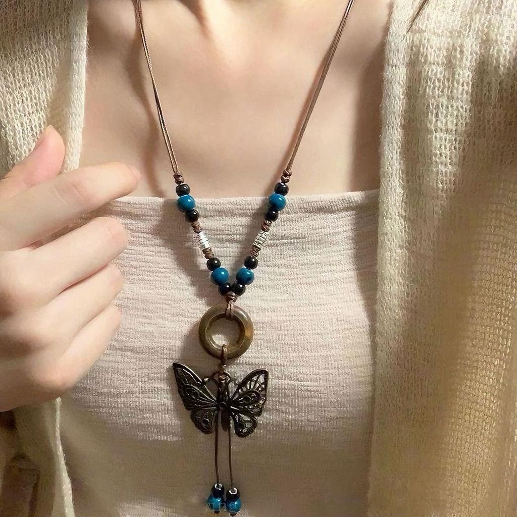 Retro pendant, ethnic style ceramic butterfly bell necklace, women's new trendy long sweater chain with accessories