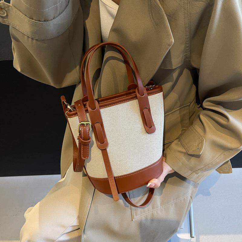 1 szt. 2025 Wybuchowa kontrastowa torba typu wiadro damska uniwersalna torba na ramię do pracy w mieście prosta torba premium wiatrówka