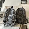 Leopard Print Backpack Casual Daily Use Trendy Street Style Lightweight Backpack for Women with Tassel Detail for School Travel and Everyday Outings